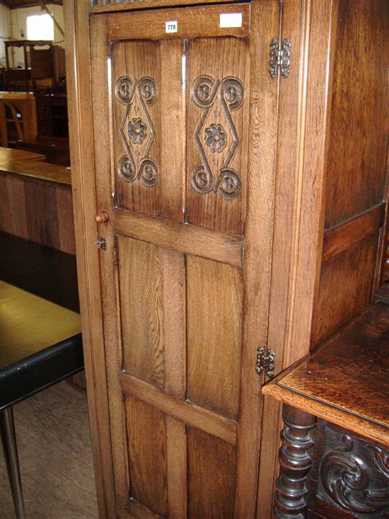Linen fold carved oak wardrobe
